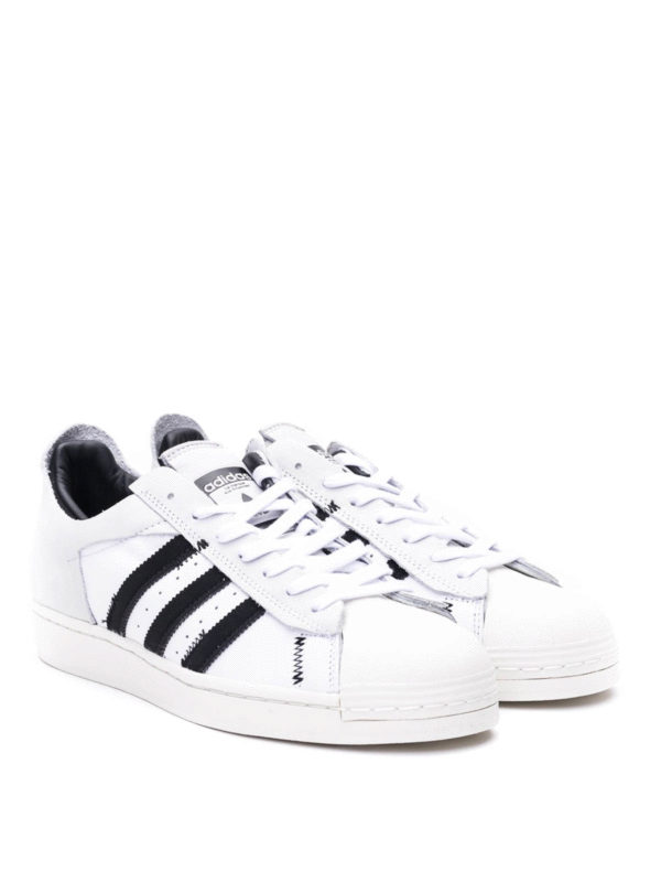 white leather adidas trainers