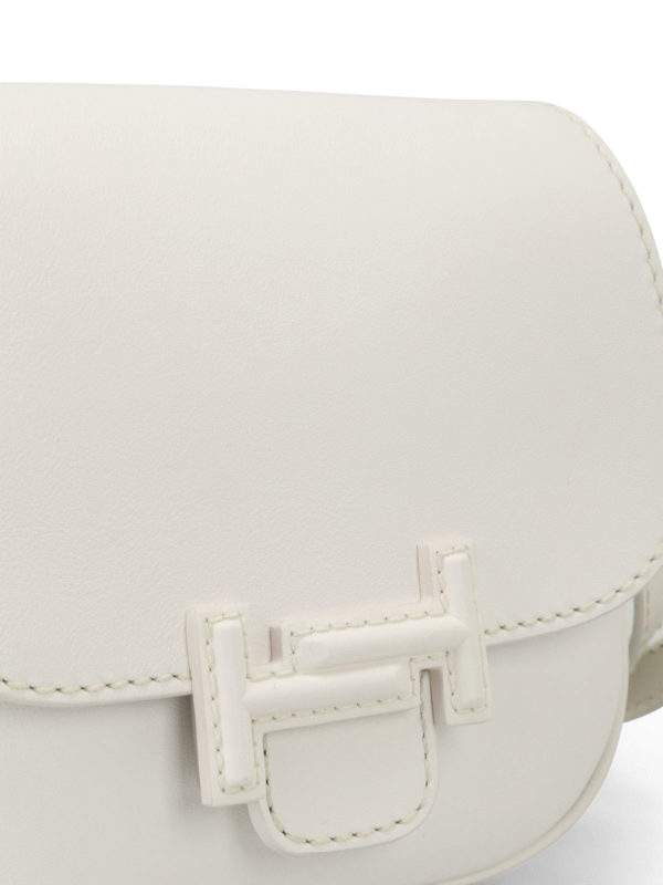 white leather saddlebags