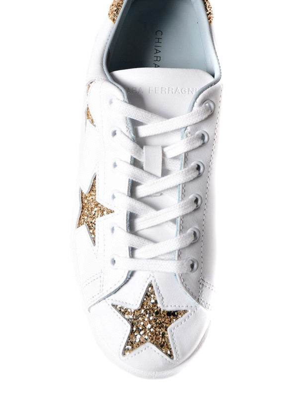 white trainers with gold stars