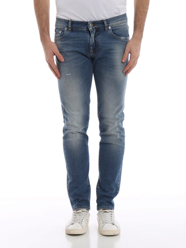 Distressed denim stone washed jeans 