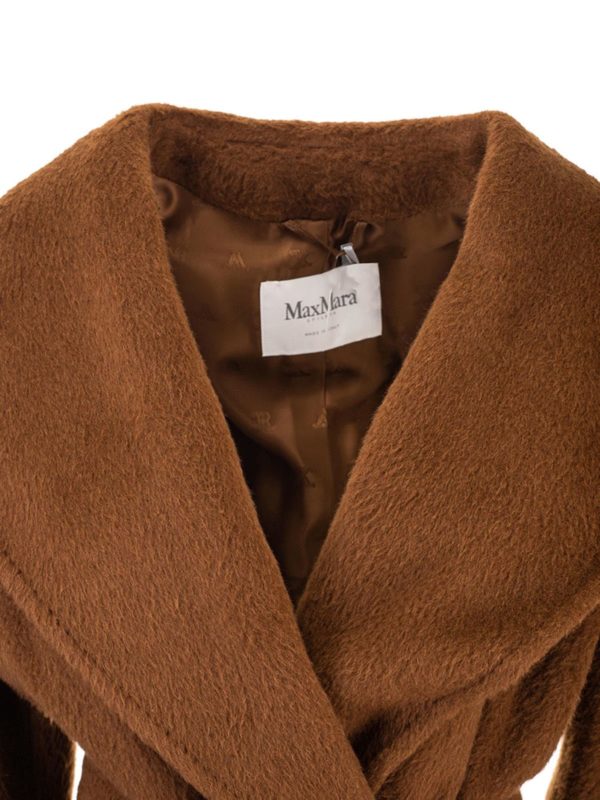 tan knee length coat
