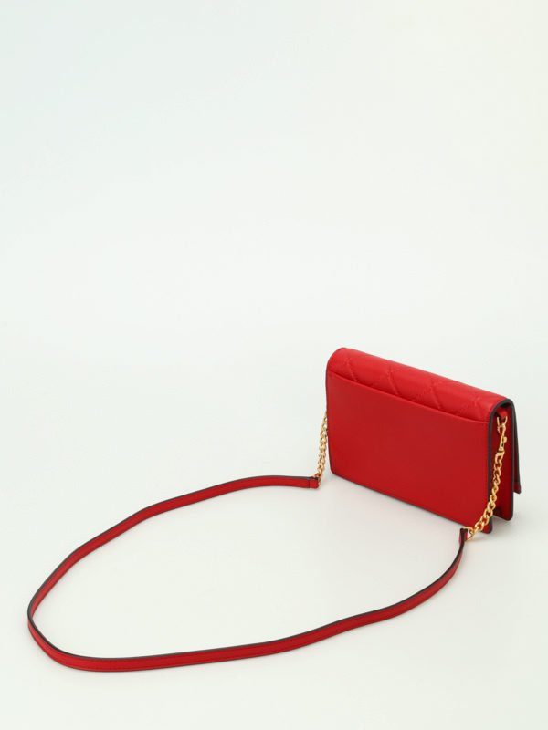 red leather clutch