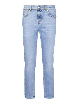 ALEXANDER MCQUEEN: jeans skinny - Jeans crop con stampa logo gotica