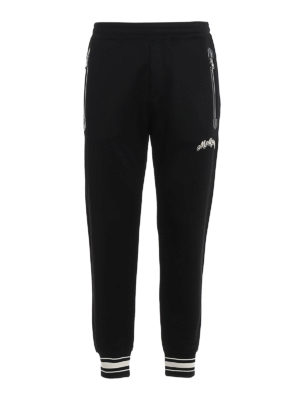 ALEXANDER MCQUEEN: tracksuit bottoms - Logo lettering joggers
