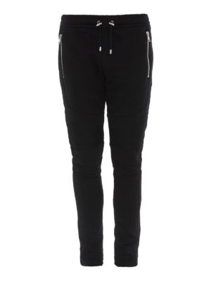 Balmain: pantaloni sport - Joggers neri con logo floccato