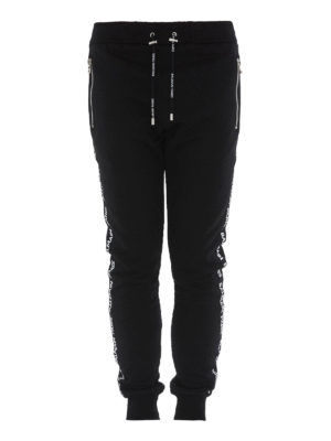Balmain: pantaloni sport - Joggers neri con banda logata