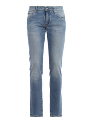 DOLCE & GABBANA: jeans skinny - Jeans skinny chiaro con placca del logo