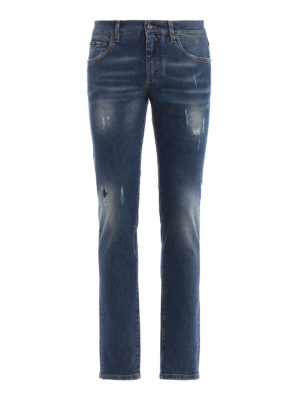 DOLCE & GABBANA: jeans skinny - Jeans skinny con abrasioni e placca logo