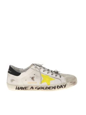 GOLDEN GOOSE: trainers - Superstar white sneakers with yellow star