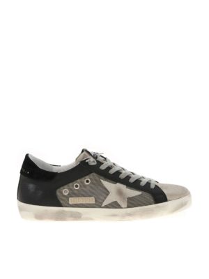 GOLDEN GOOSE: trainers - Vintage effect Superstar sneakers in black