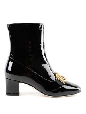GUCCI: tronchetti - Stivaletti in vernice con doppia G
