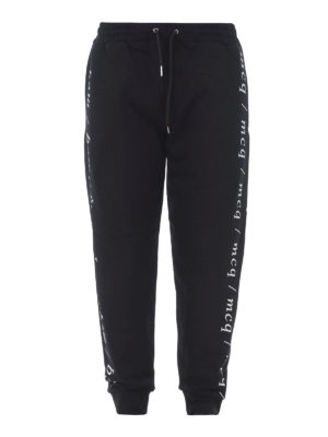 MCQ: pantaloni sport - Joggers in cotone con stampa mcq ai lati