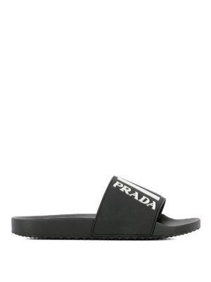 PRADA: sandals - Embossed logo rubber and leather slides
