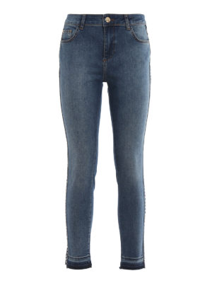 TWINSET: jeans skinny - Jeans Aurèlie a vita bassa con borchie