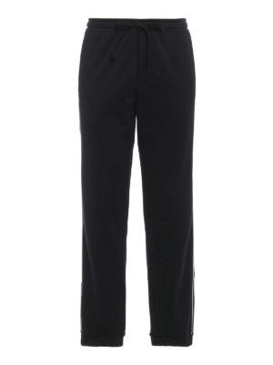 VALENTINO: pantaloni sport - Joggers in cotone con stampa VLTN dietro