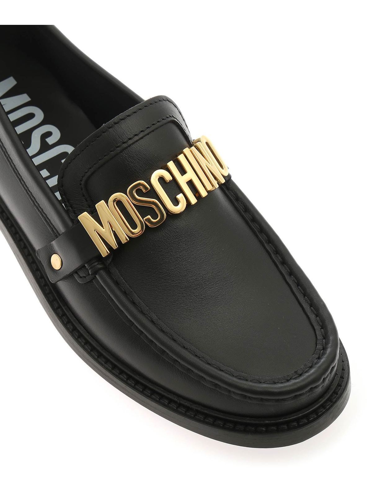 Behalf walk Rainy Loafers & Slippers Moschino - Lettering loafers in black - MA10362C1DMF0000