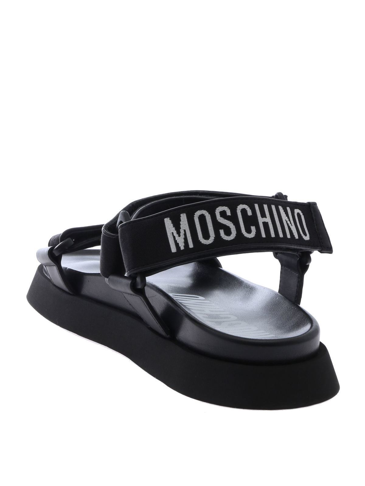 Sandals Moschino - Black sandals with branded straps - MB16024G07GP0000
