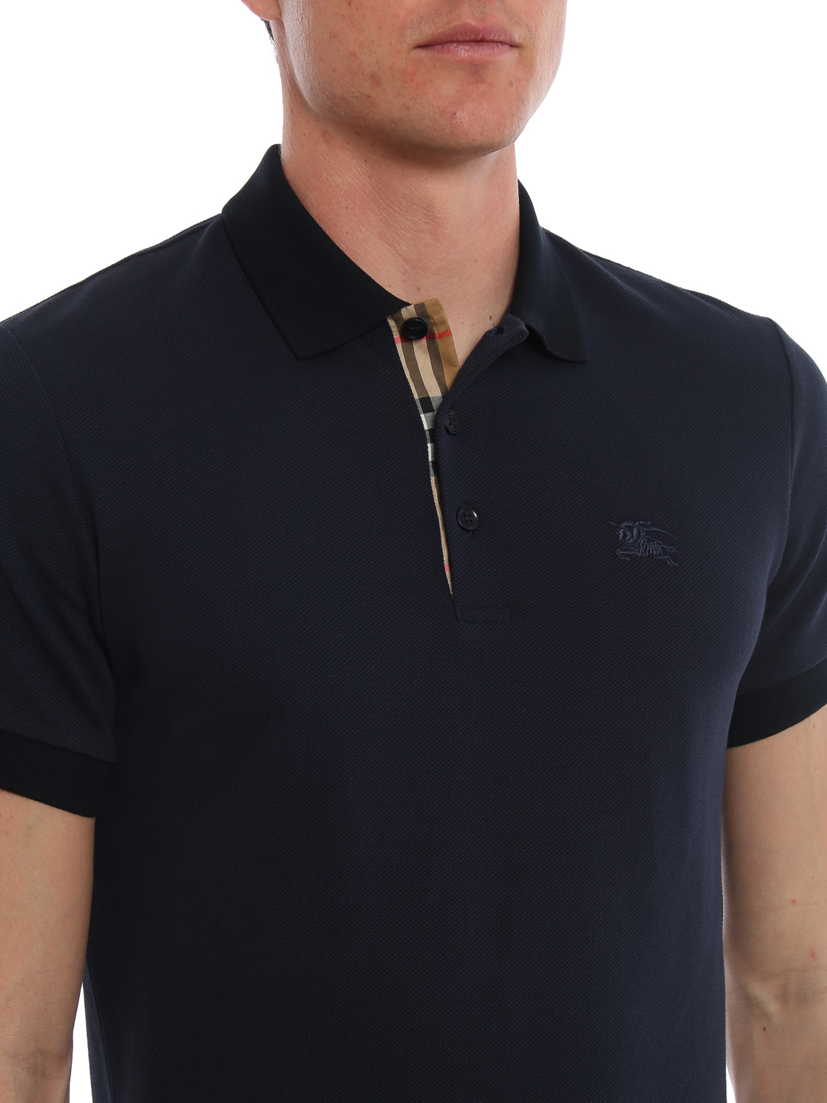 Dark blue polo shirt with check placket 