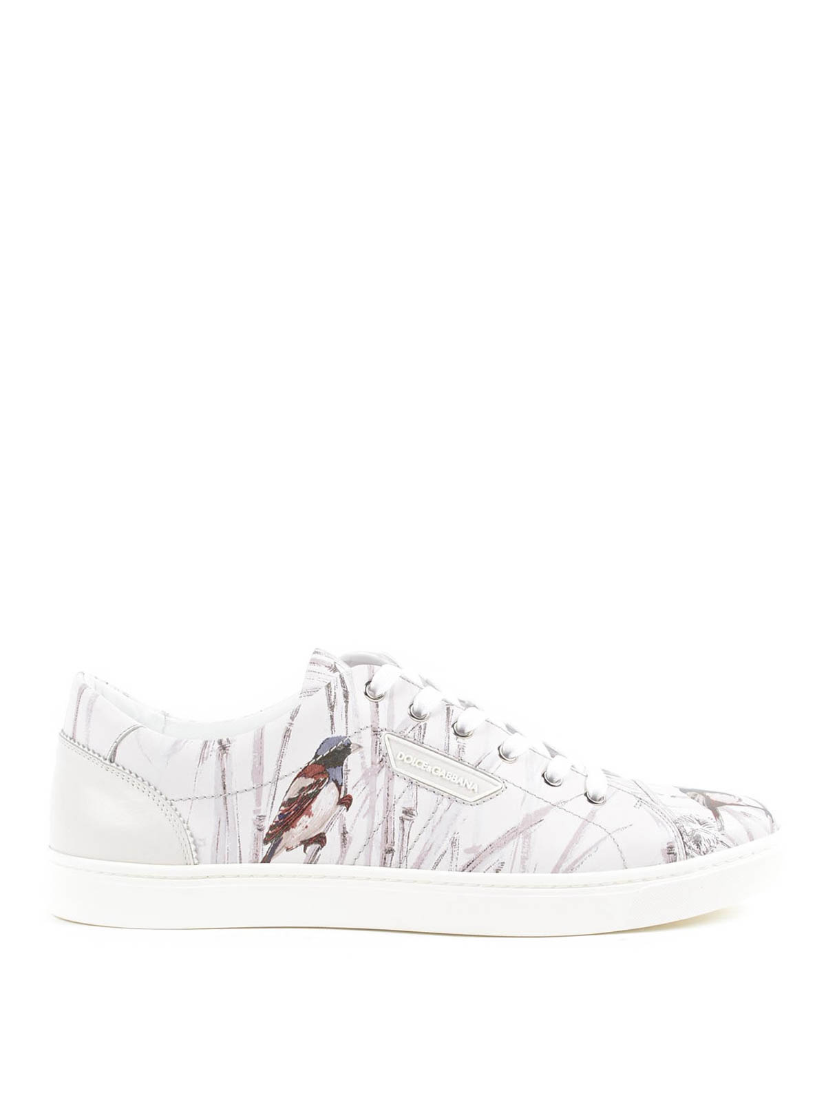 white trainers with birds on