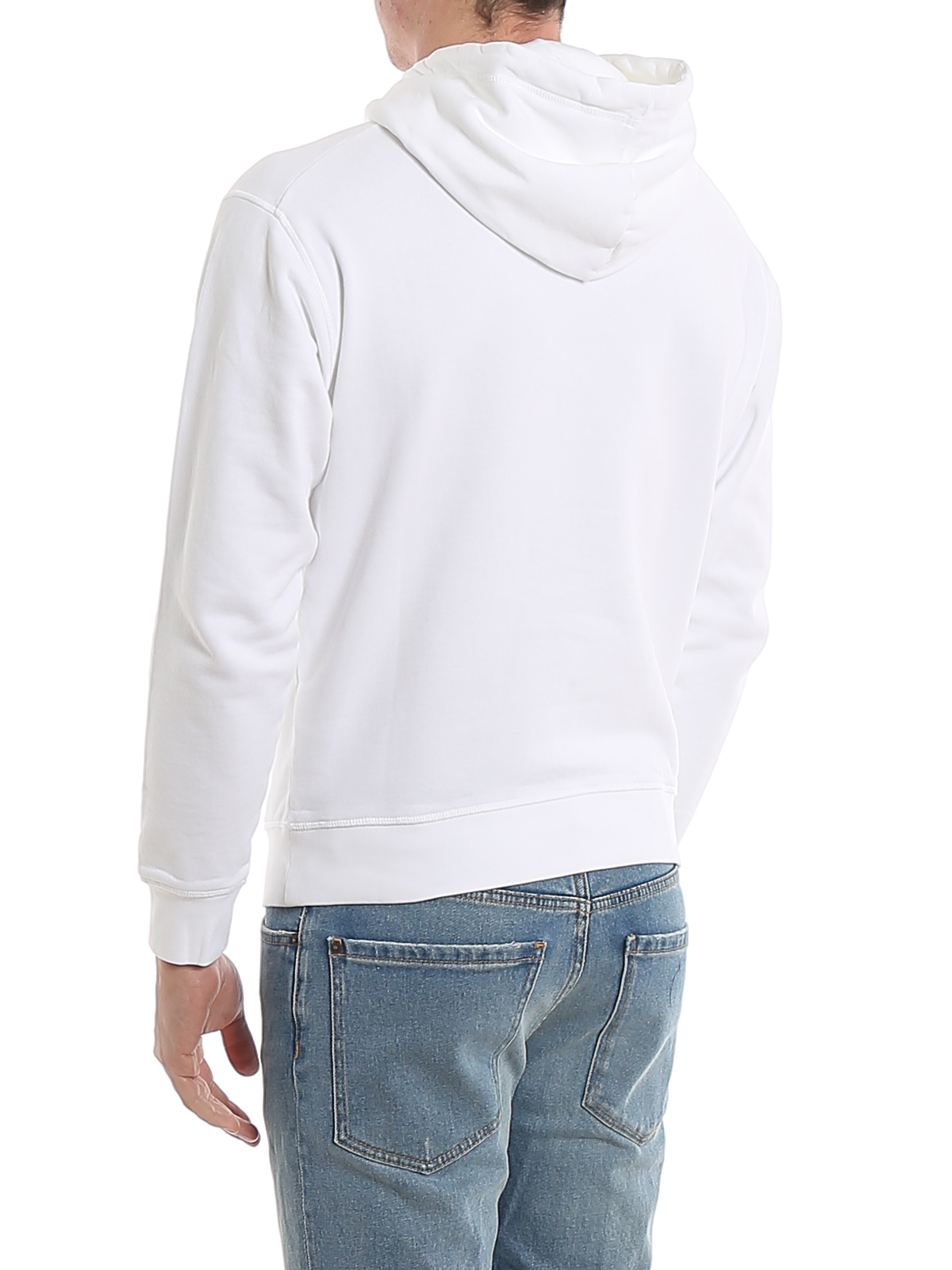 white hoodie and jeans