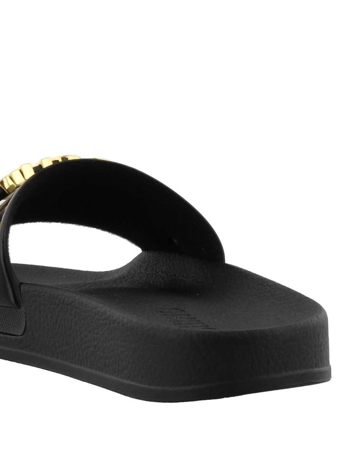 black and gold moschino slides