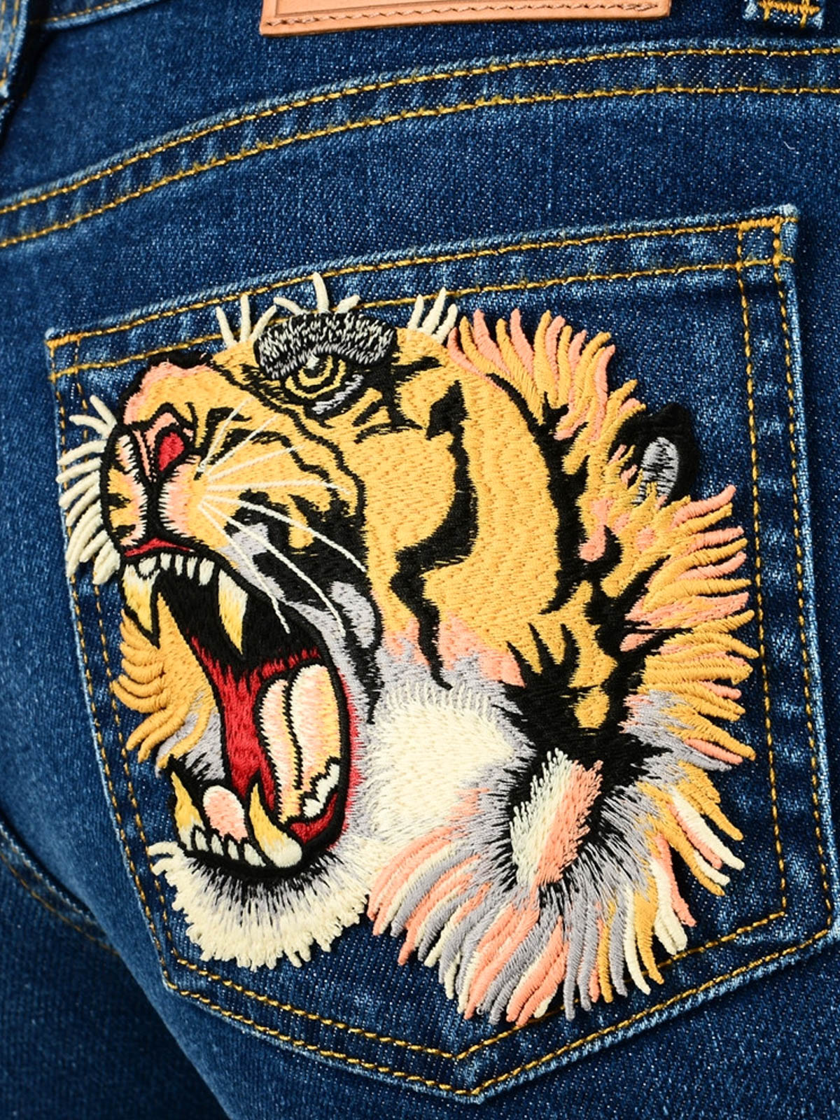 gucci tiger jeans
