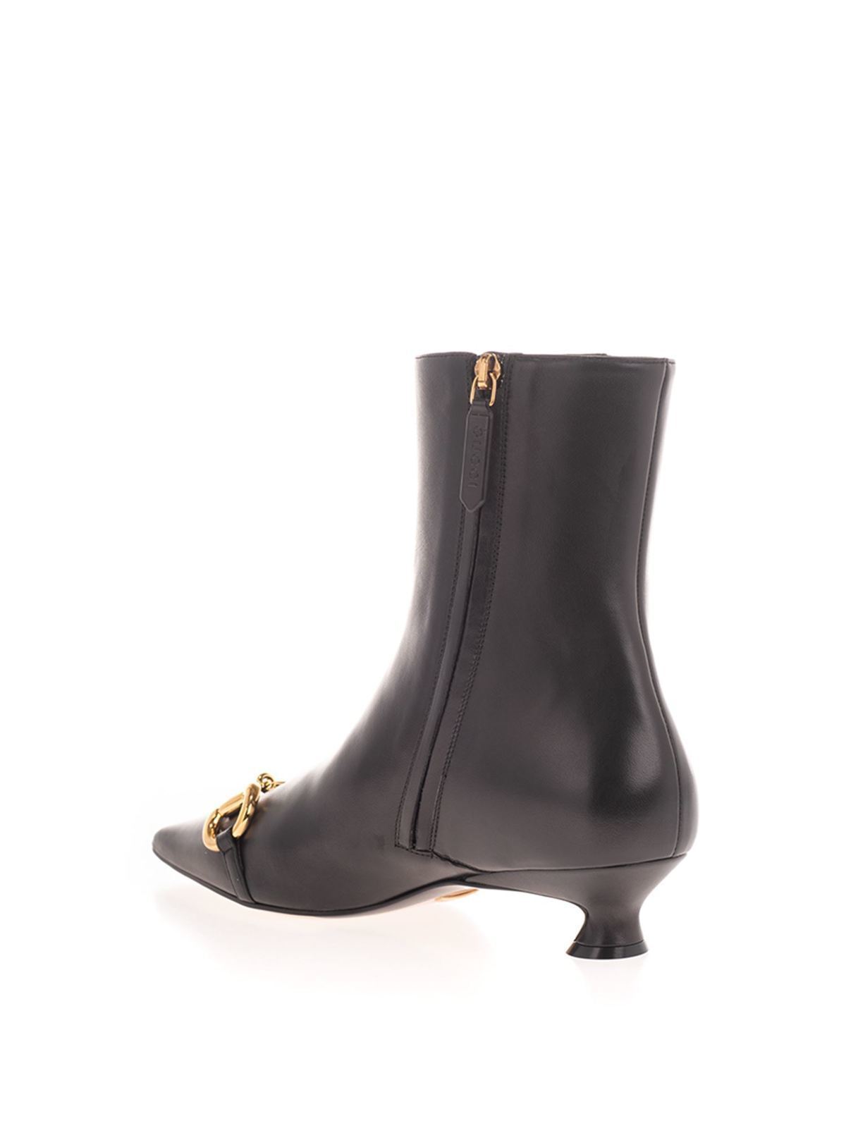 Gucci - Horsebit ankle boots in black 