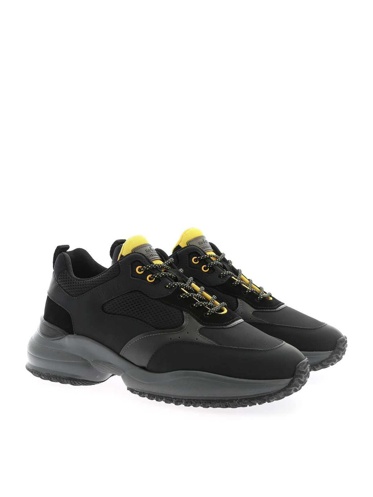 black and yellow trainers