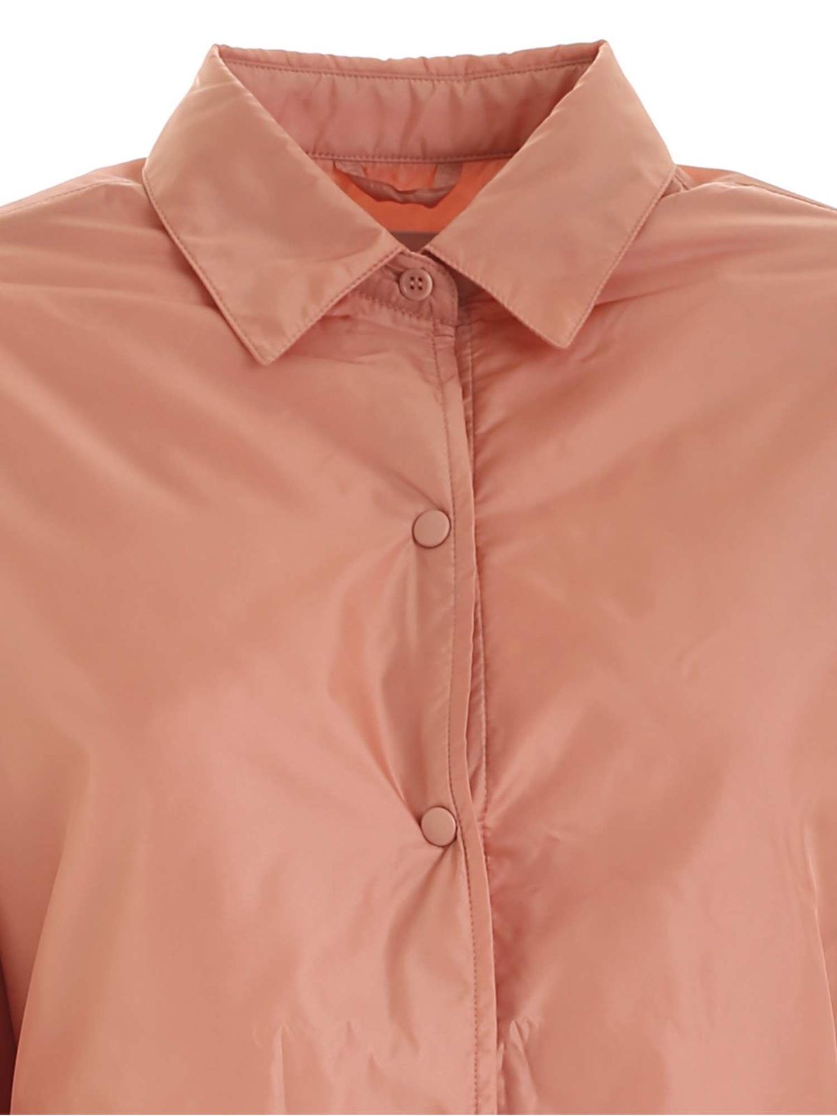 salmon color shirt