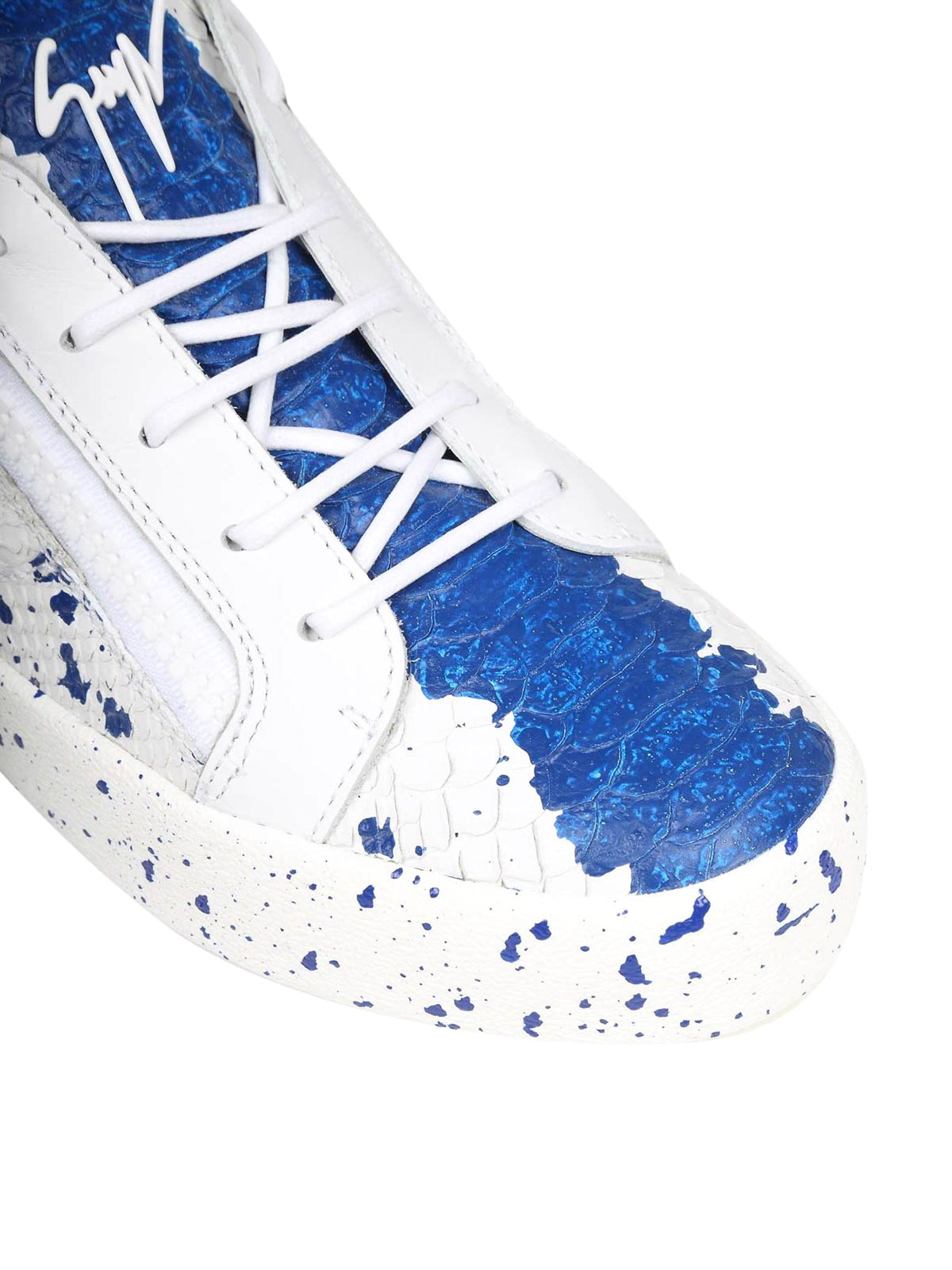 white leather trainer paint