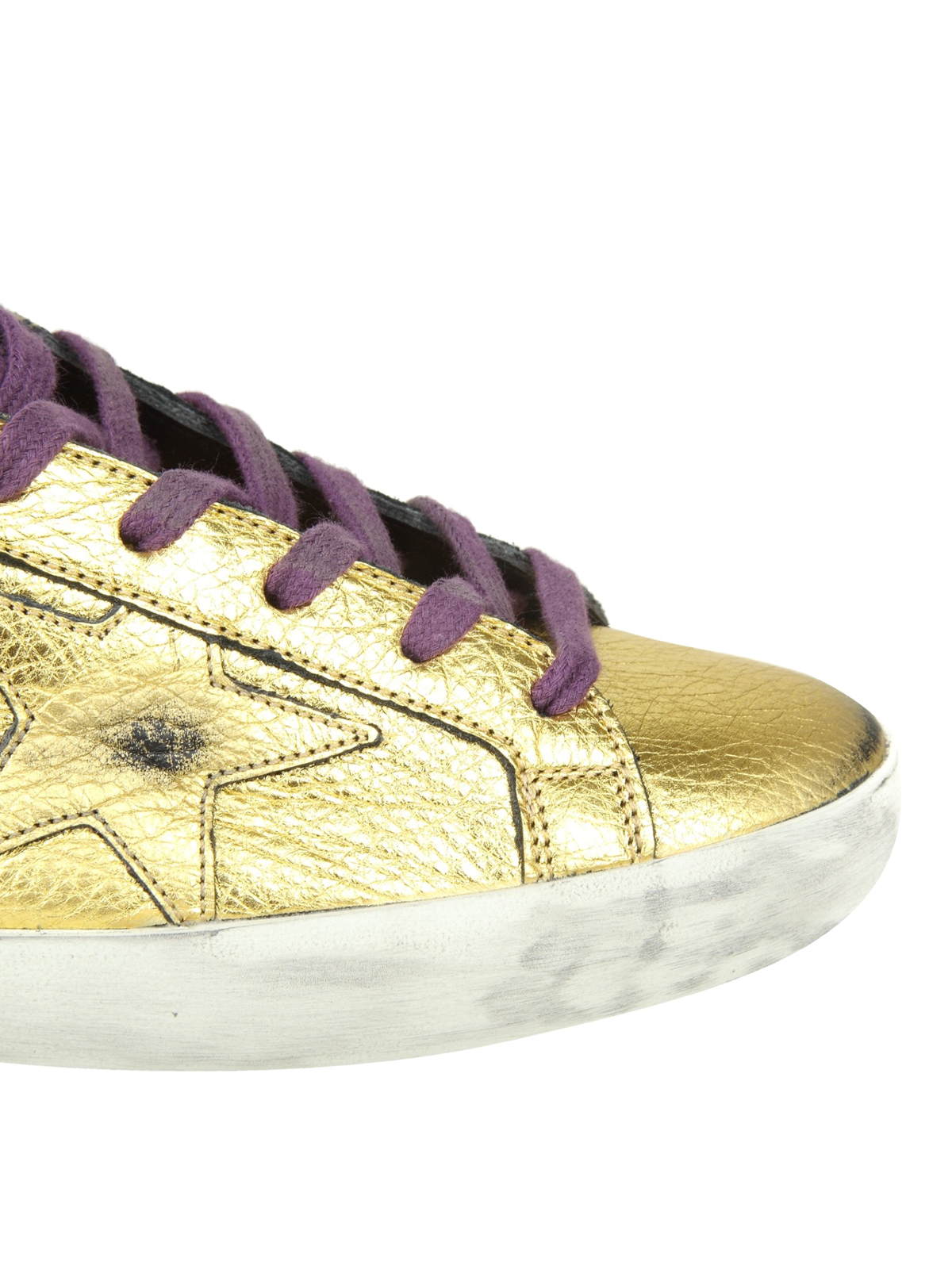 gold and purple sneakers