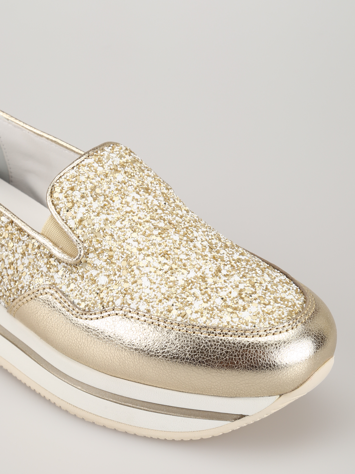 gold slip on trainers