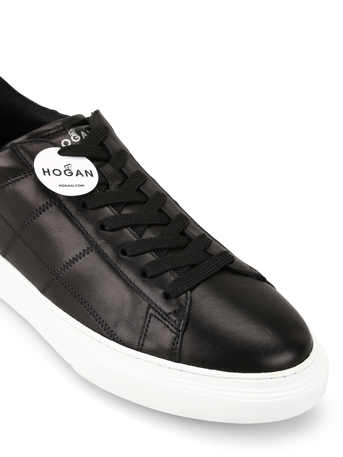 black leather low top sneakers