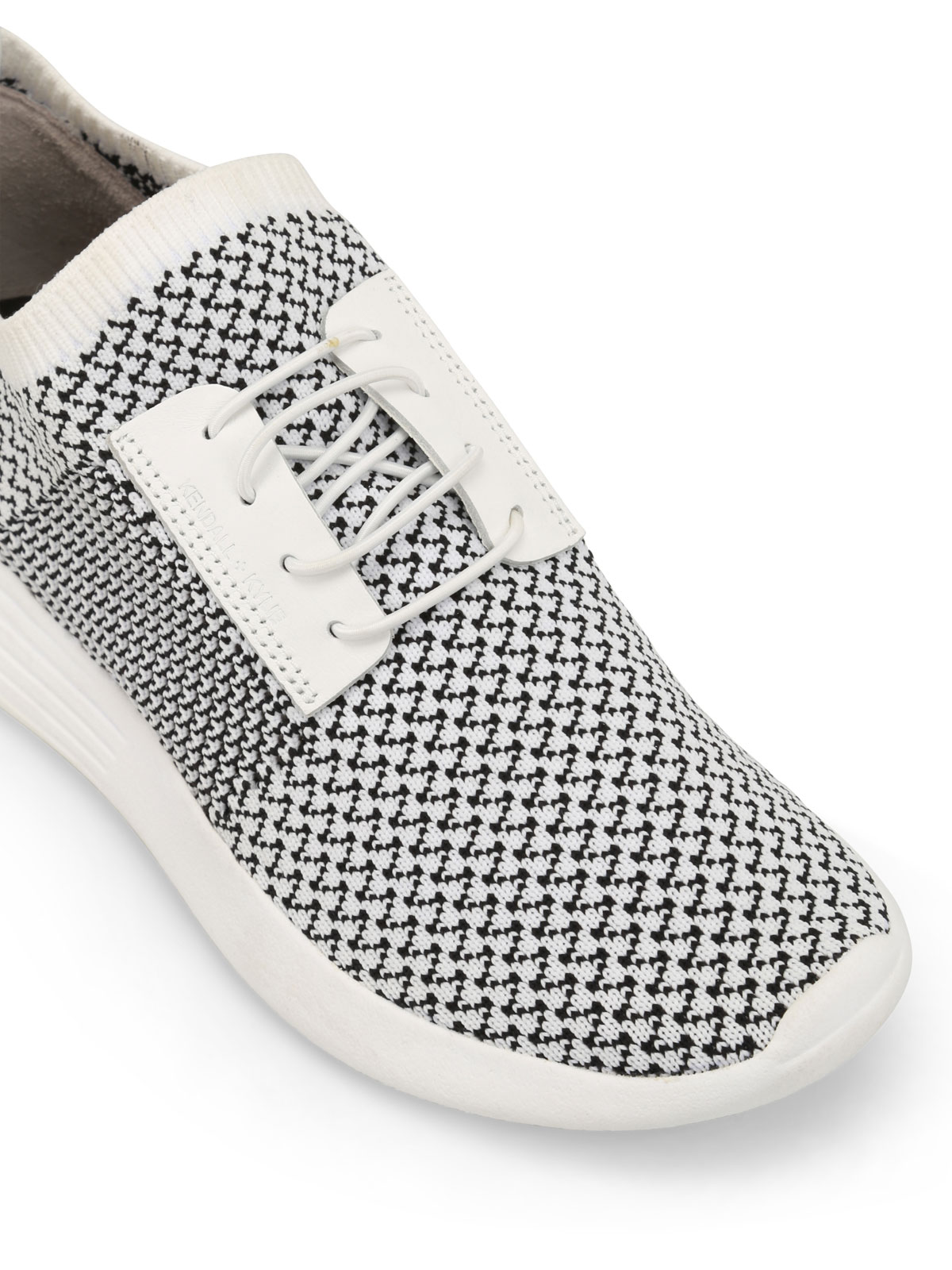white slip on trainers