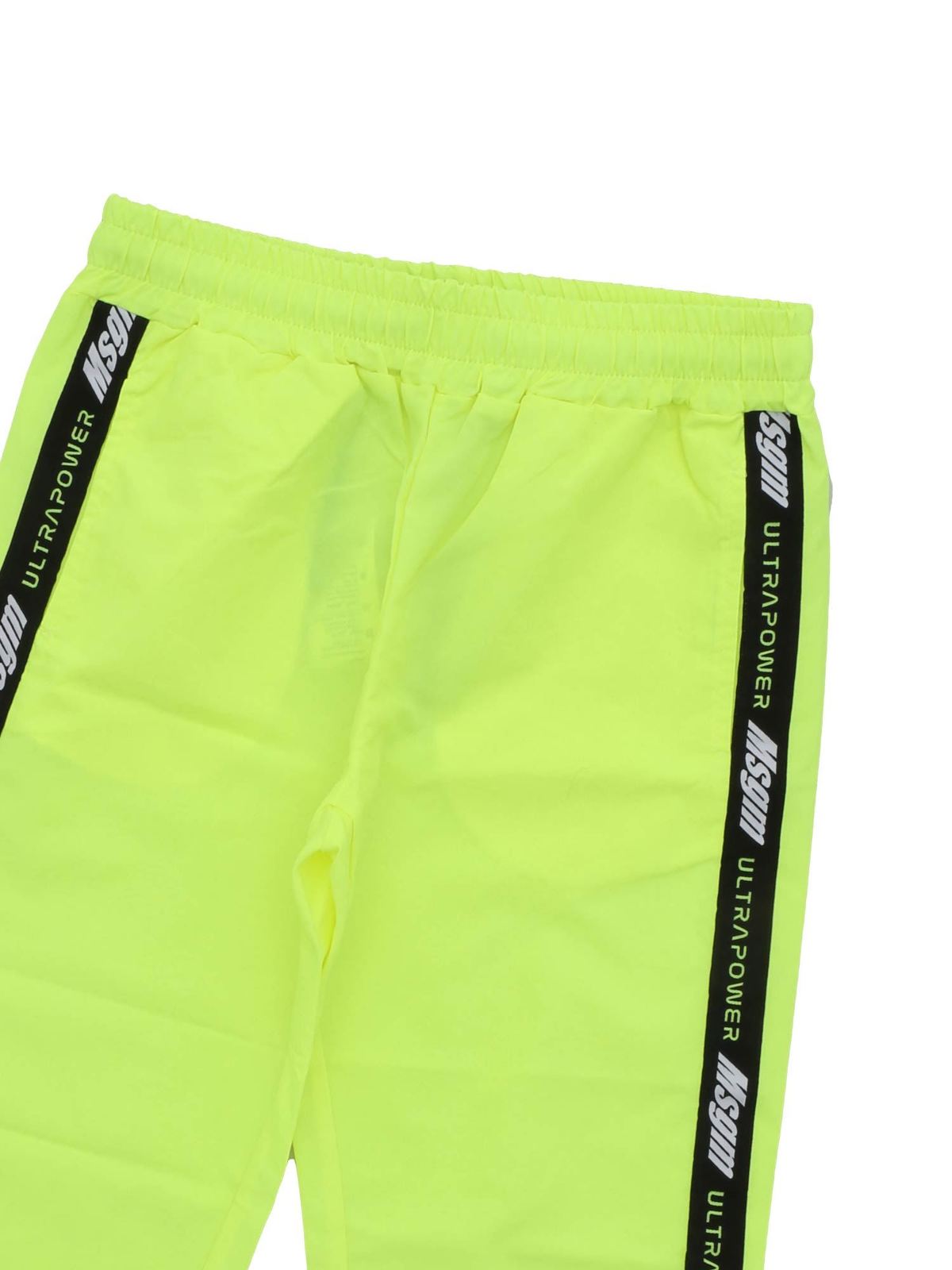 neon yellow track pants