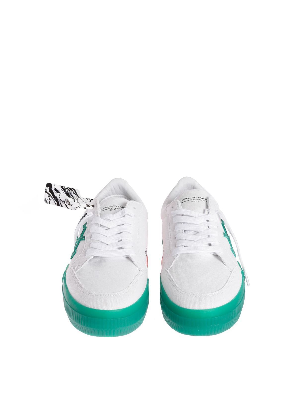 green and white tennis shoes