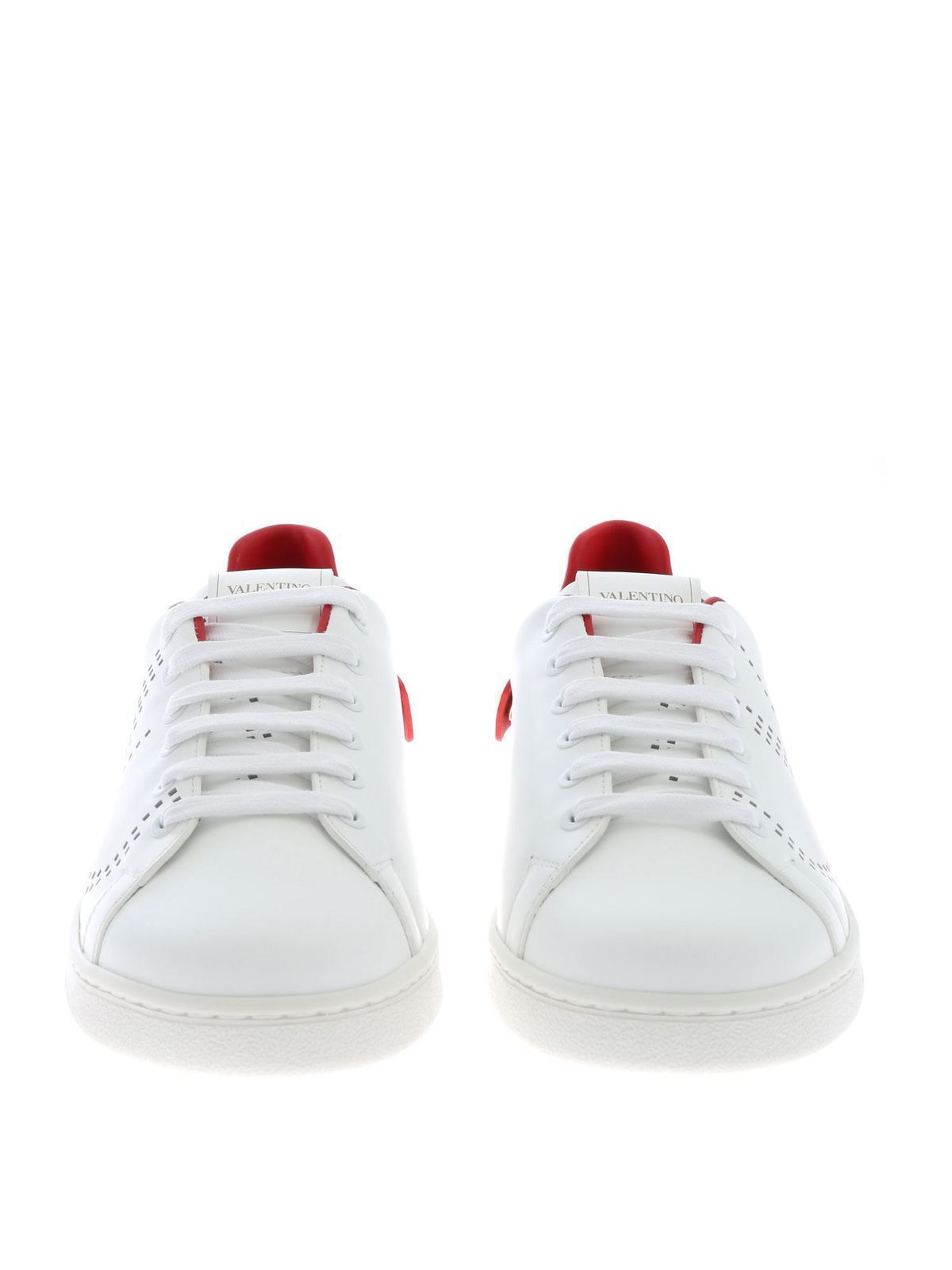 white trainers with red back