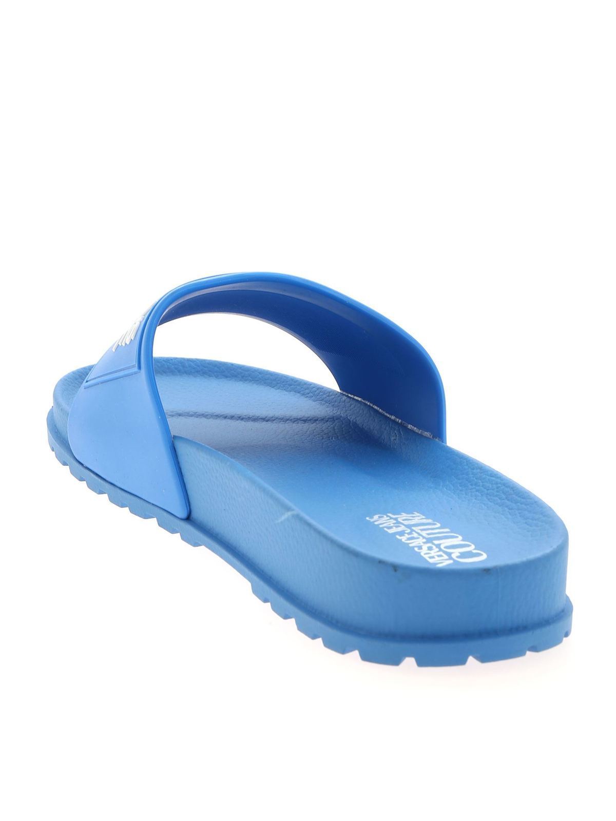 in blue slippers