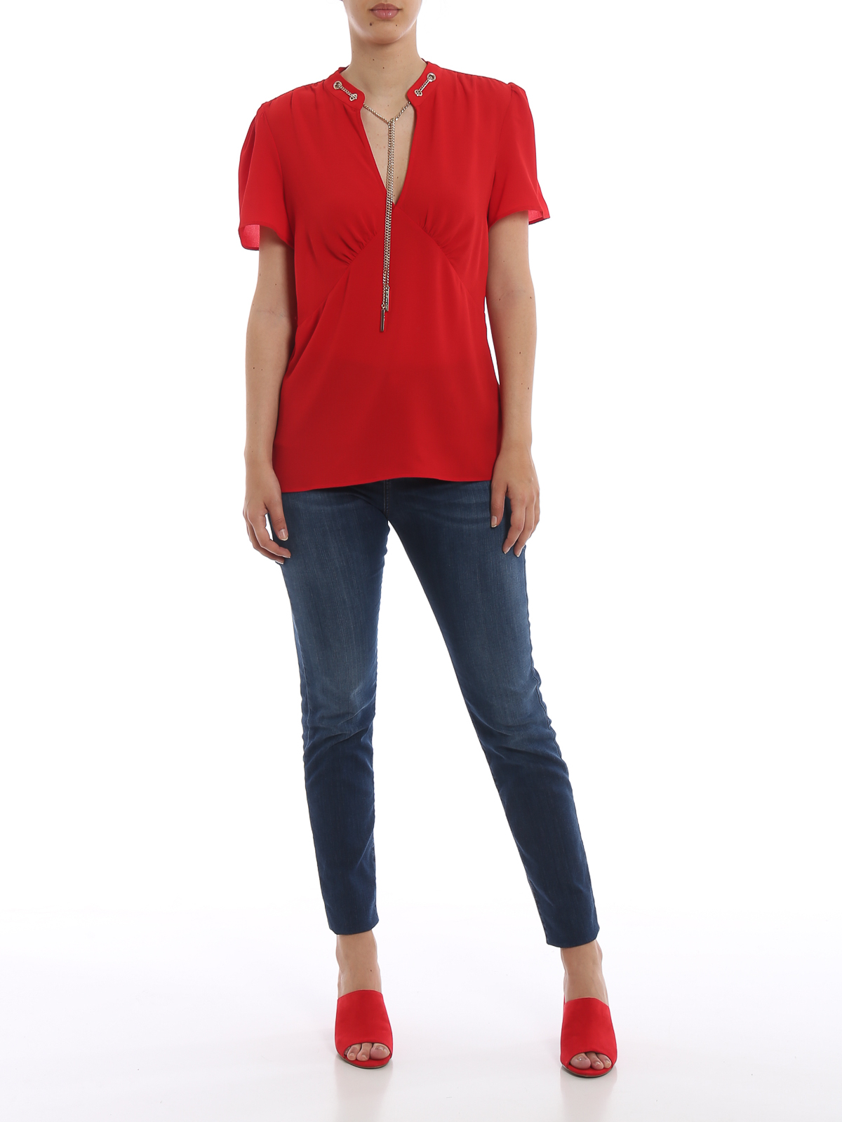 Red blouse with gold-tone chain 
