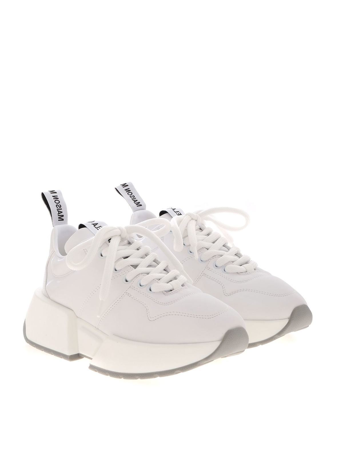 white branded trainers