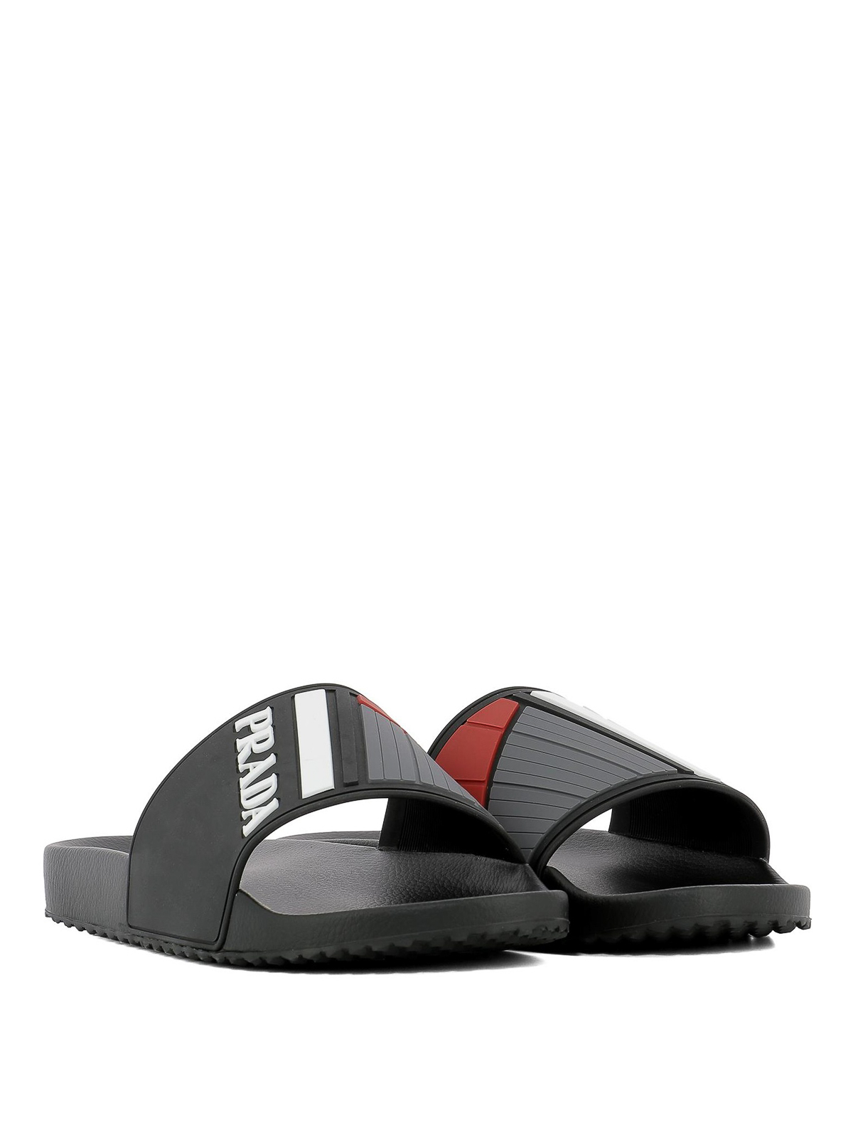 Embossed logo rubber and leather slides 