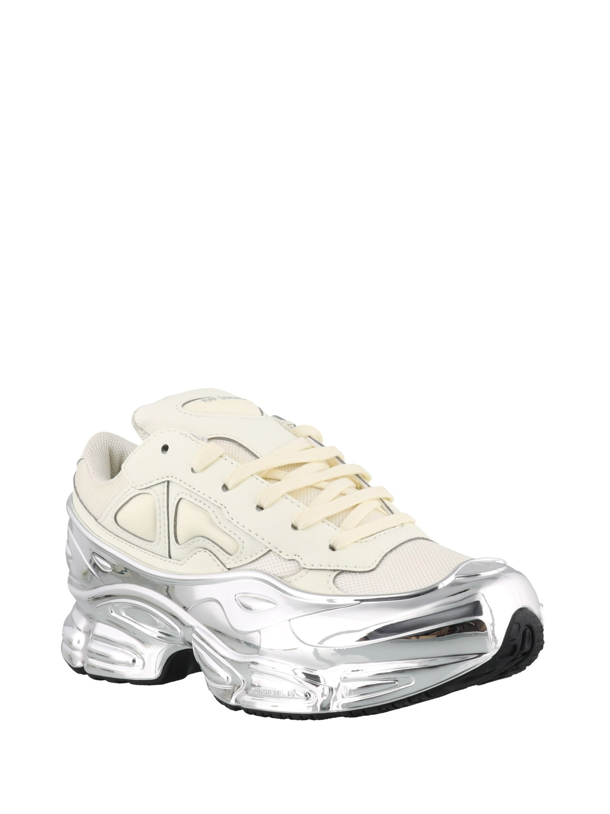 chunky white adidas trainers