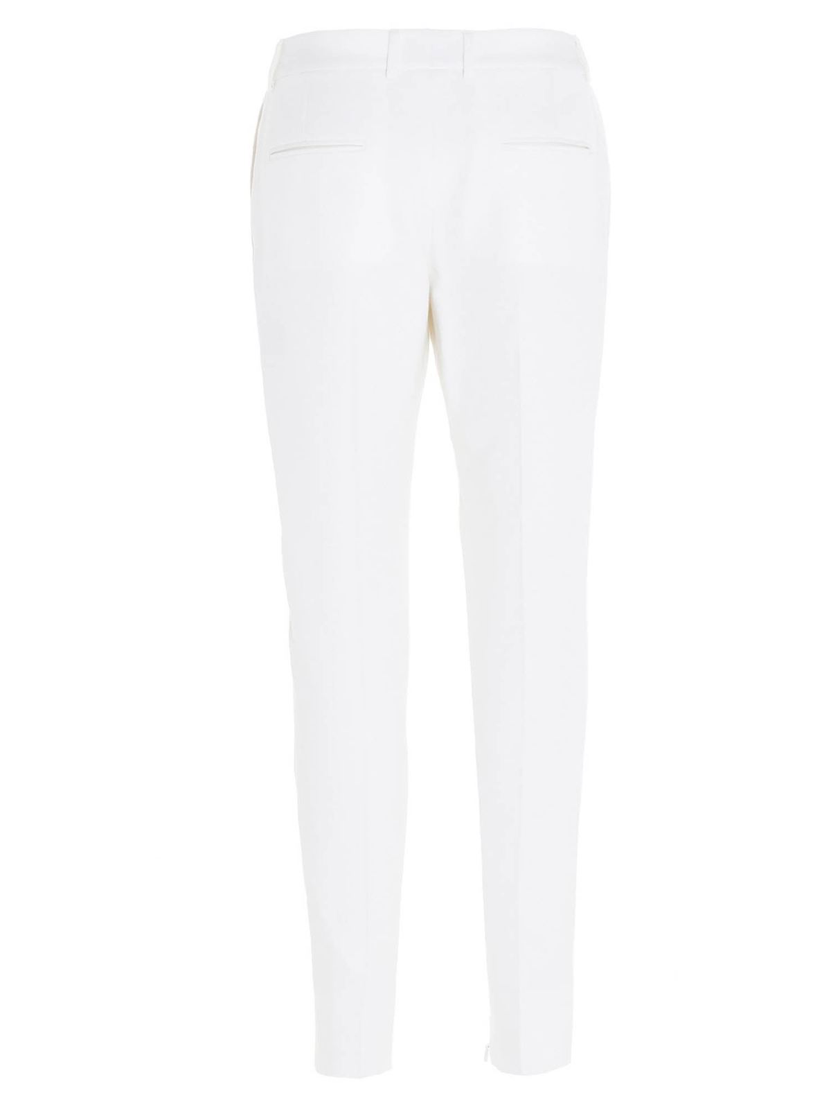 Casual trousers Saint Laurent - Classic Le Smoking pants in white ...