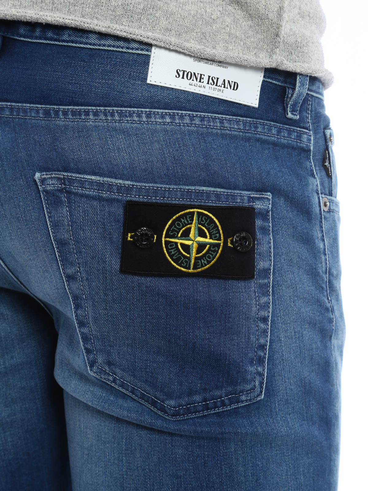 stone island ripped jeans