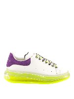 Sneakers in pelle con suola fluo