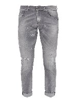 Jeans sbiaditi con strappi