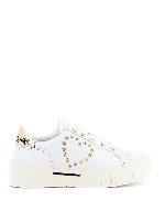 Sneakers con occhielli dorati