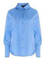 Camicia azzurra con tasca a toppa