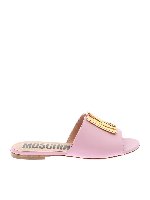 Mules rosa con logo metallico