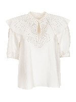 Top con volant color crema